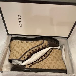 GUCCI
Tan/Beige/Brown Original GG Canvas High Top Sneakers
